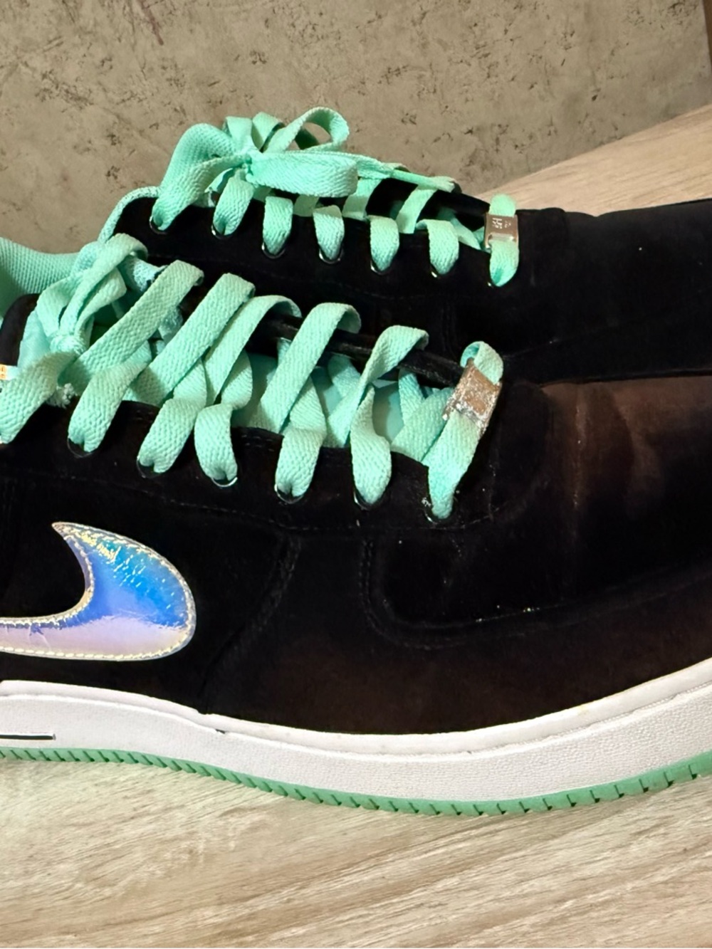 Nike Black Sneakers with Mint Green Lining and Iridescent Swoosh